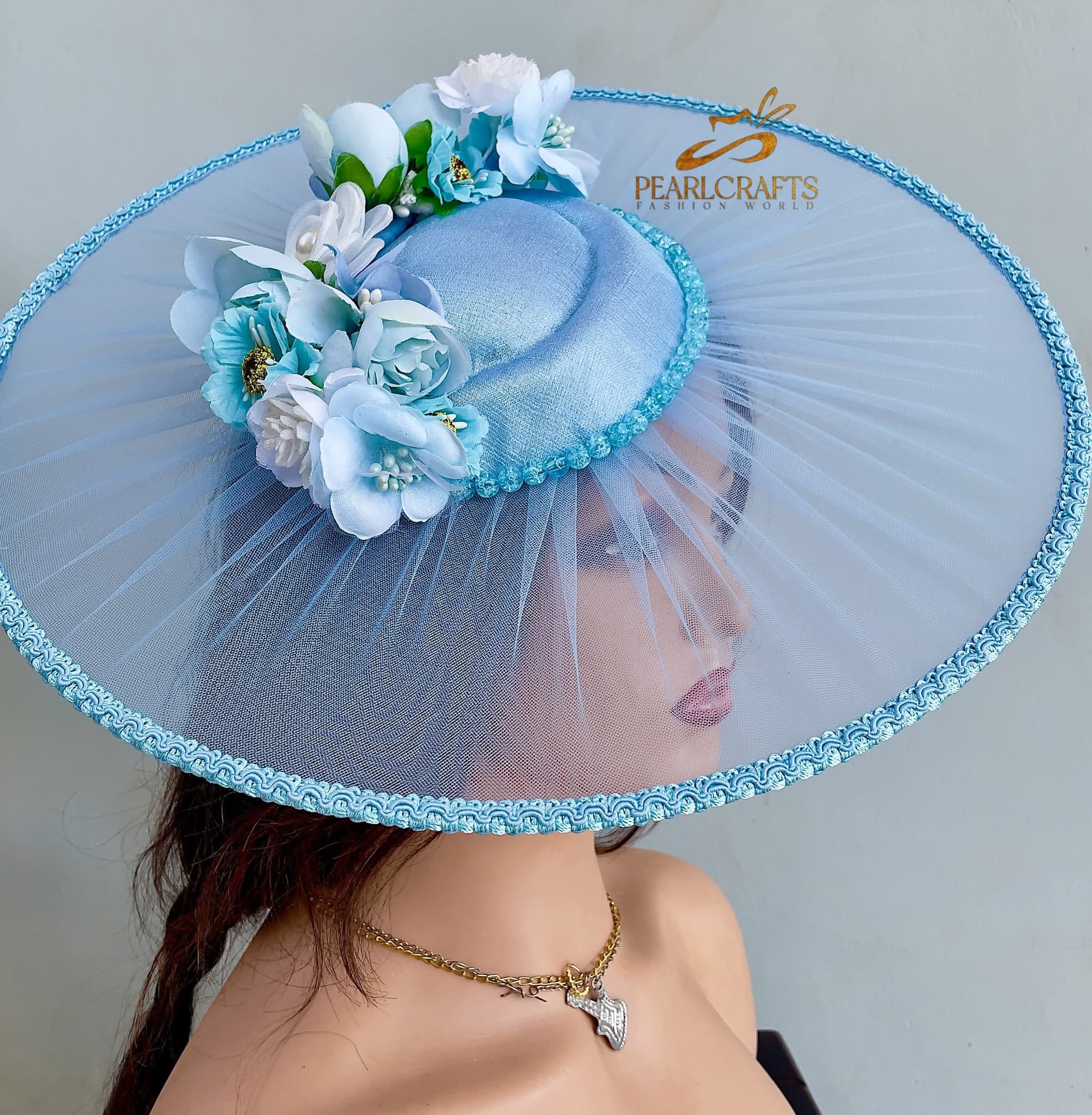 Elegant bridal headpiece by PEARLCRAFTS FASHION WORLD